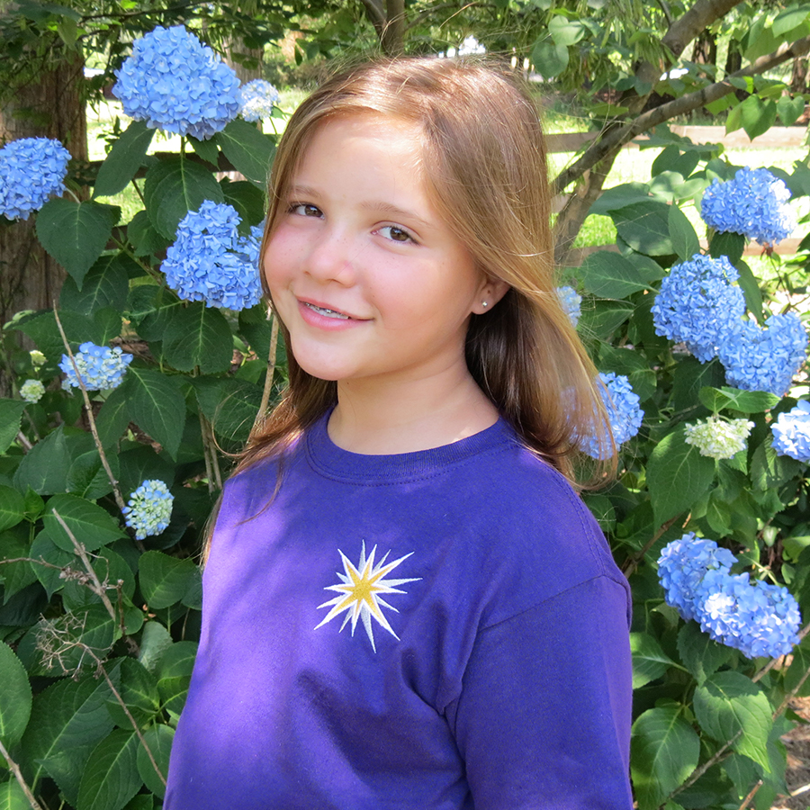 Kaitlyn Spaugh in a purple Moravian shirt